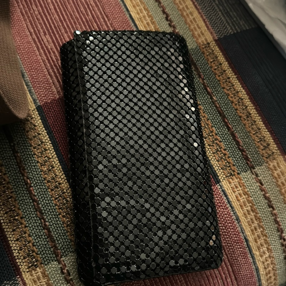 Black clutch never been used